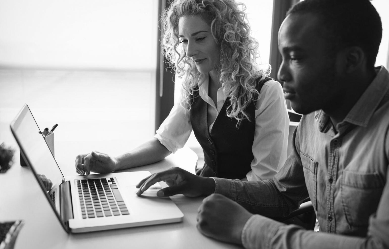 Analyst reviewing market data and technology sector trends